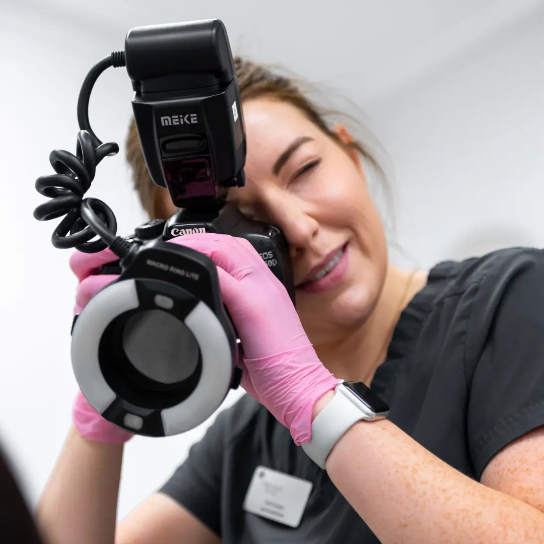York Place Dental team member taking clinical photographs for a patient smile transformation in Carlisle